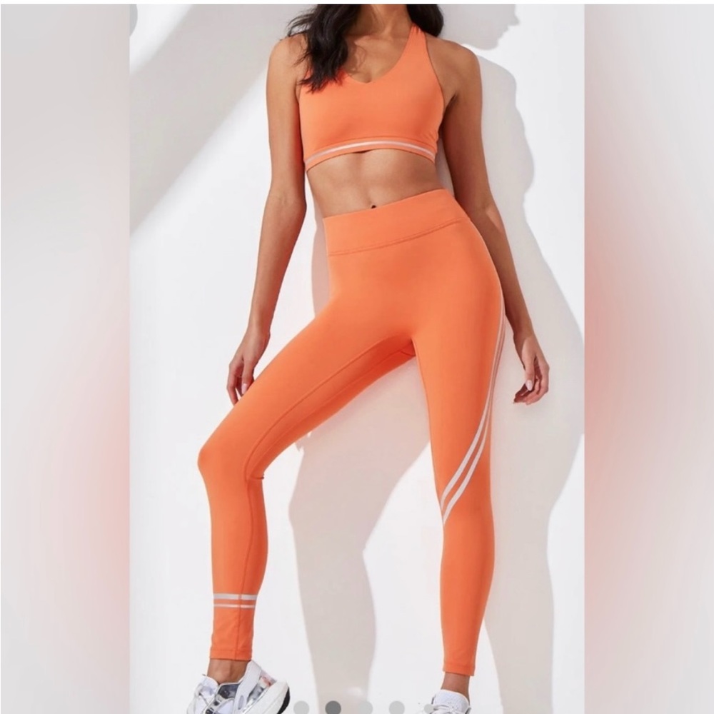 Beautiful S NWT Noli Hype legging in orange blaze with reflective stripes- wow!